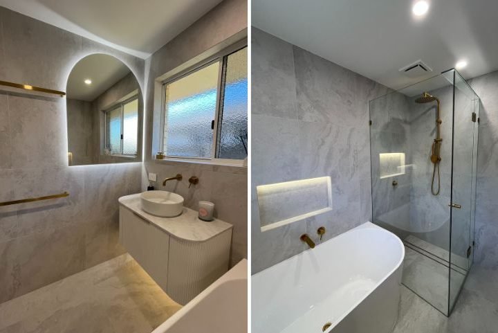 Modern bathroom with glass shower and stylish fixtures.