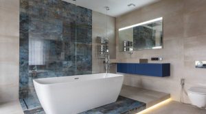 Modern bathroom with freestanding tub and blue accents.