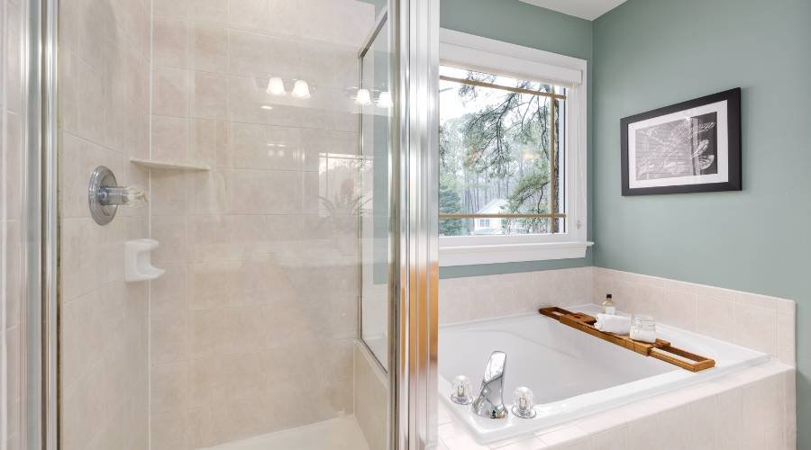 Modern bathroom with tub and glass shower