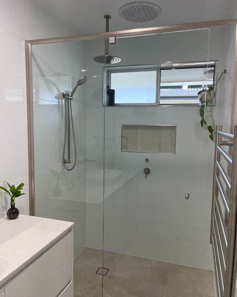 Modern glass shower with rainfall showerhead