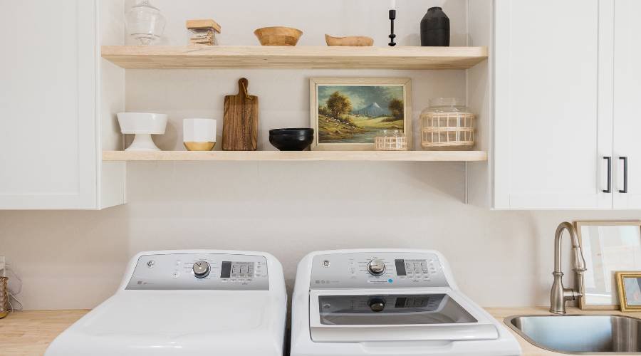 small laundry renovation space maximization storage solutions gold coast apartment
